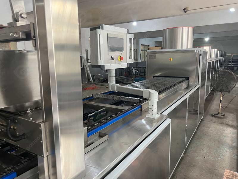 Multifunctional candy depositing line for gummies, caramels, and hard sugar candies