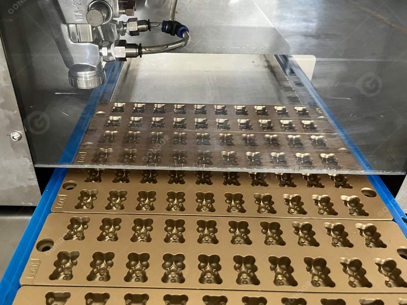 Food-grade gummy mold machine with non-stick molds for easy demolding