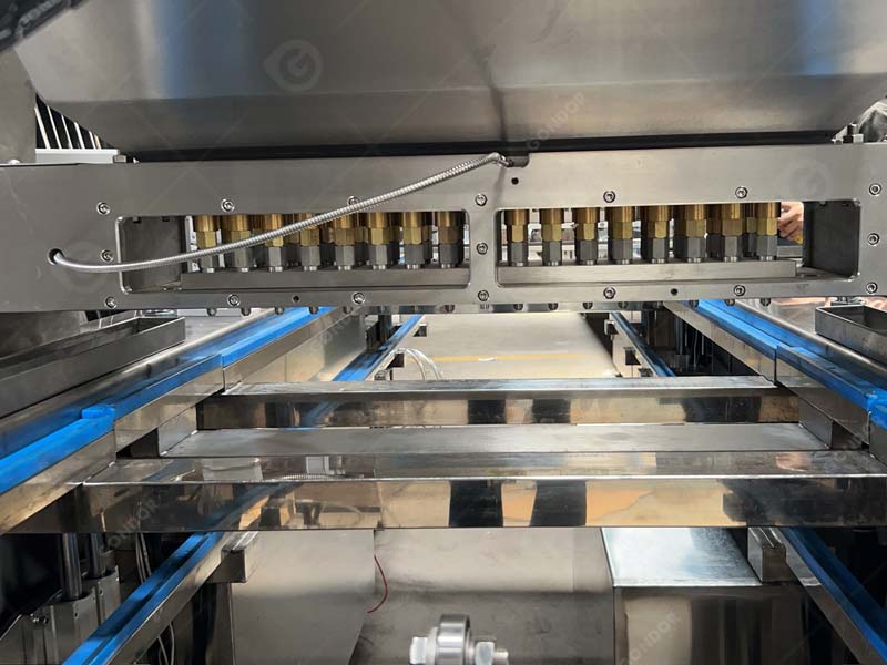 Lollipop depositing line with cooling conveyor (fast candy solidification)