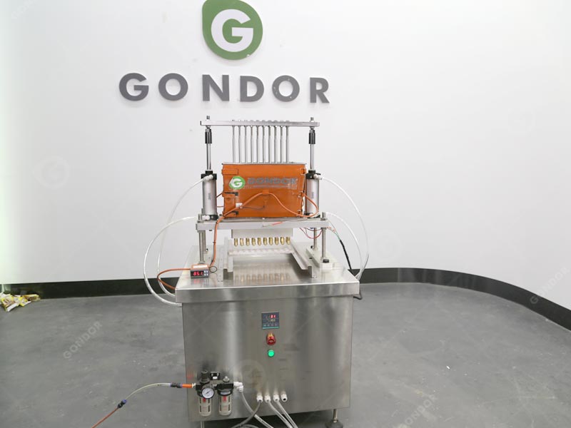 Semi automatic gummy machine with temperature control for soft, chewy gummy texture