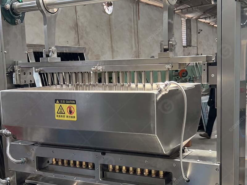 High-precision lollipop depositing line for uniform candy portioning (1-5g per lollipop)