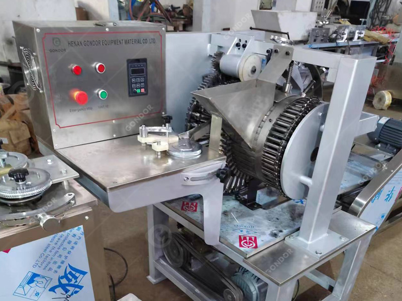 Compact ball lollipop forming machine for limited factory space