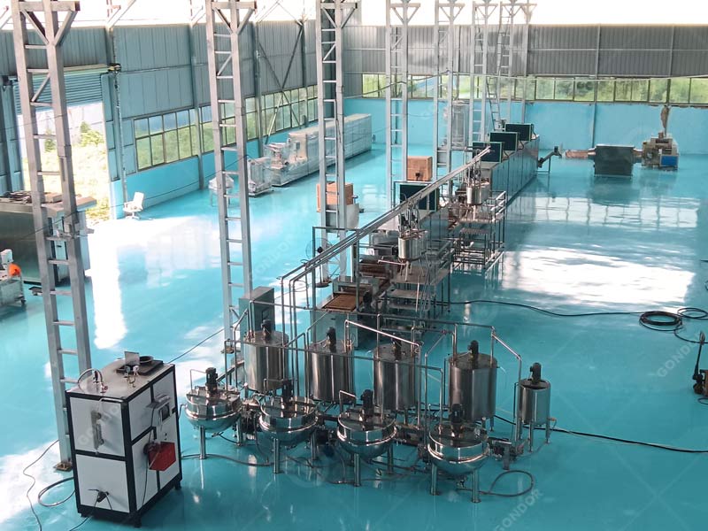 Multi-functional candy manufacturing machine for hard/soft/gummy candies